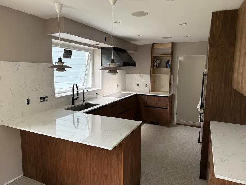 Kitchen counters and full-height backsplash